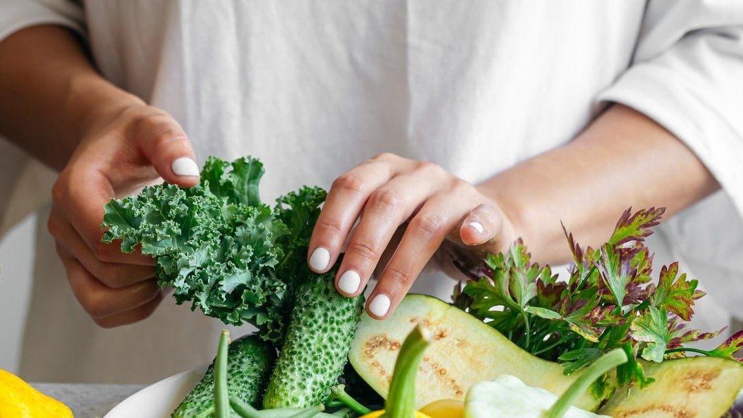 woman cutting vegetables
