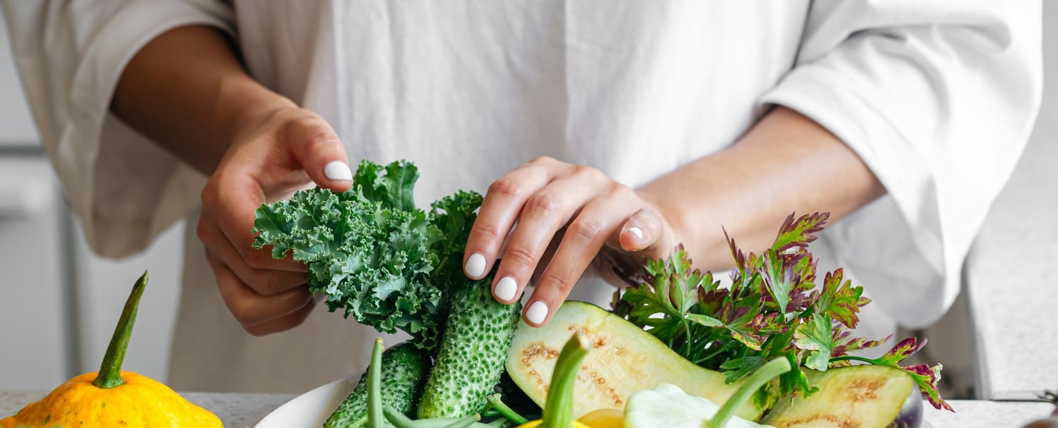 woman cutting vegetables
